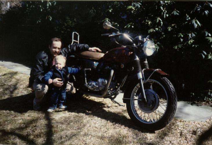 with dad on bike